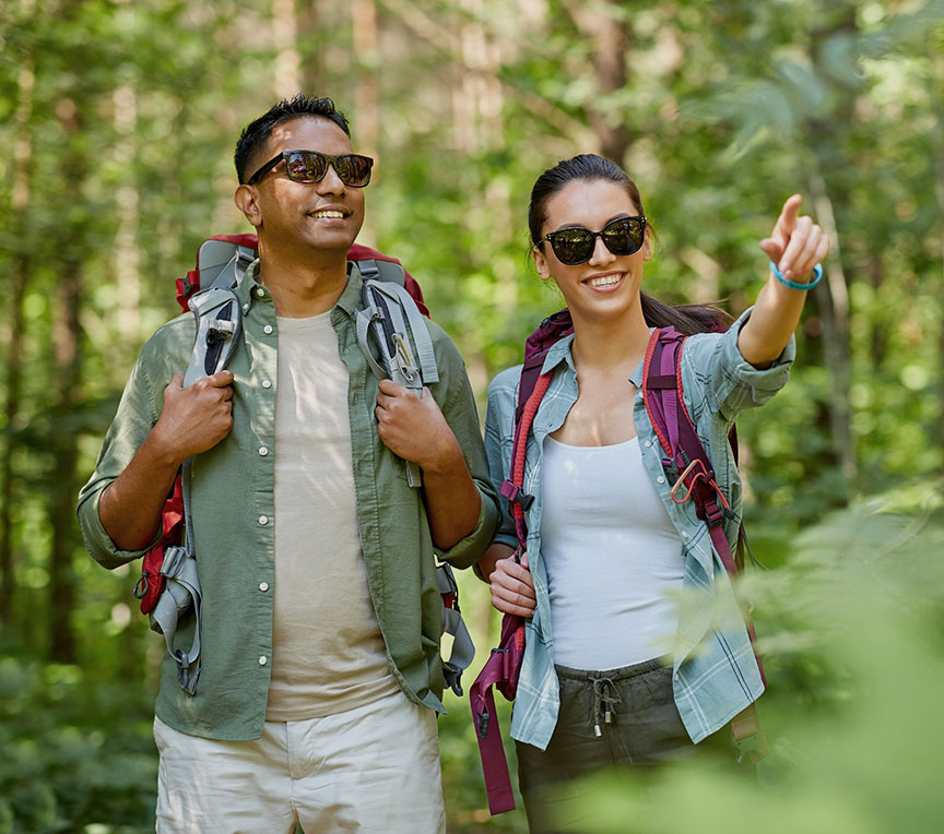 Couple hiking in the woods in Virginia