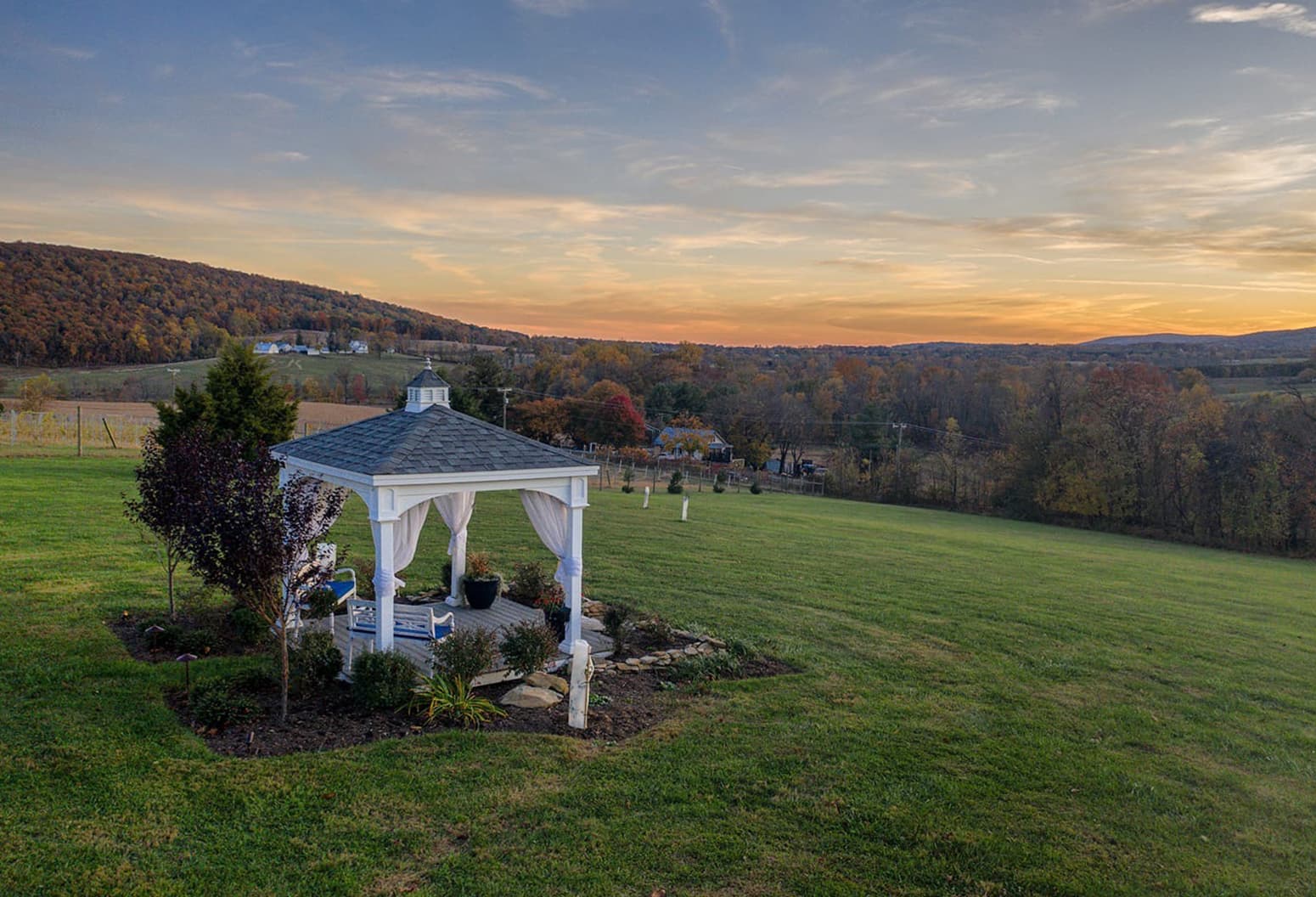 View from gazebo at Hidden View Bed and Breakfast at sunset